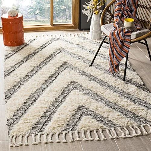 Safavieh Aria texturerad kant med fransar, handknuten ull och bomullsmatta i svart/elfenben, 121 x 182 cm 889048577145